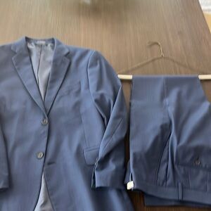 Blue suit suit coat is size 42S and pants are 34x30